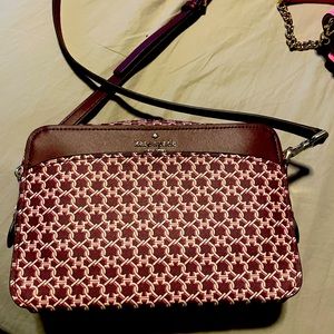 Kate Spade maroon patterned cross by bag